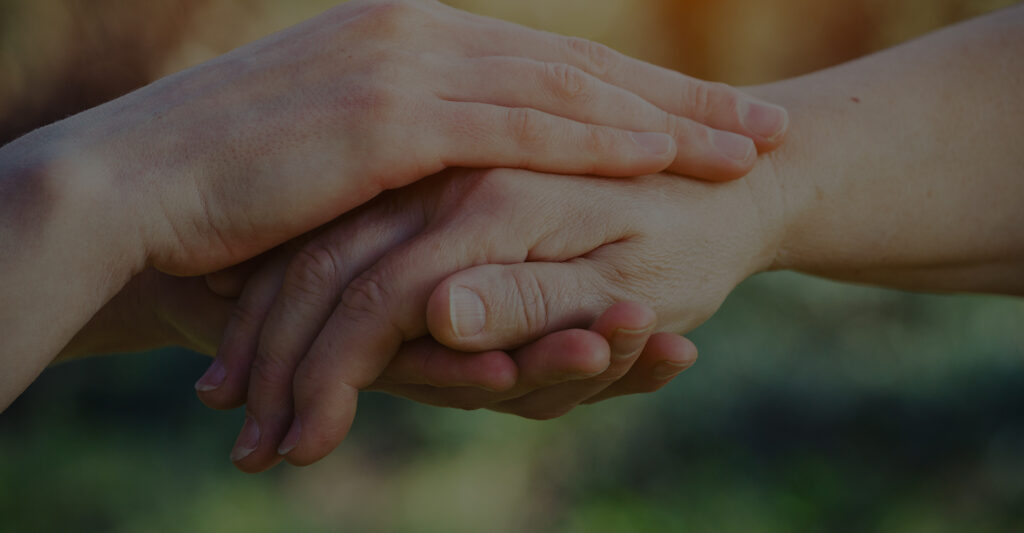 Image of people holding hands