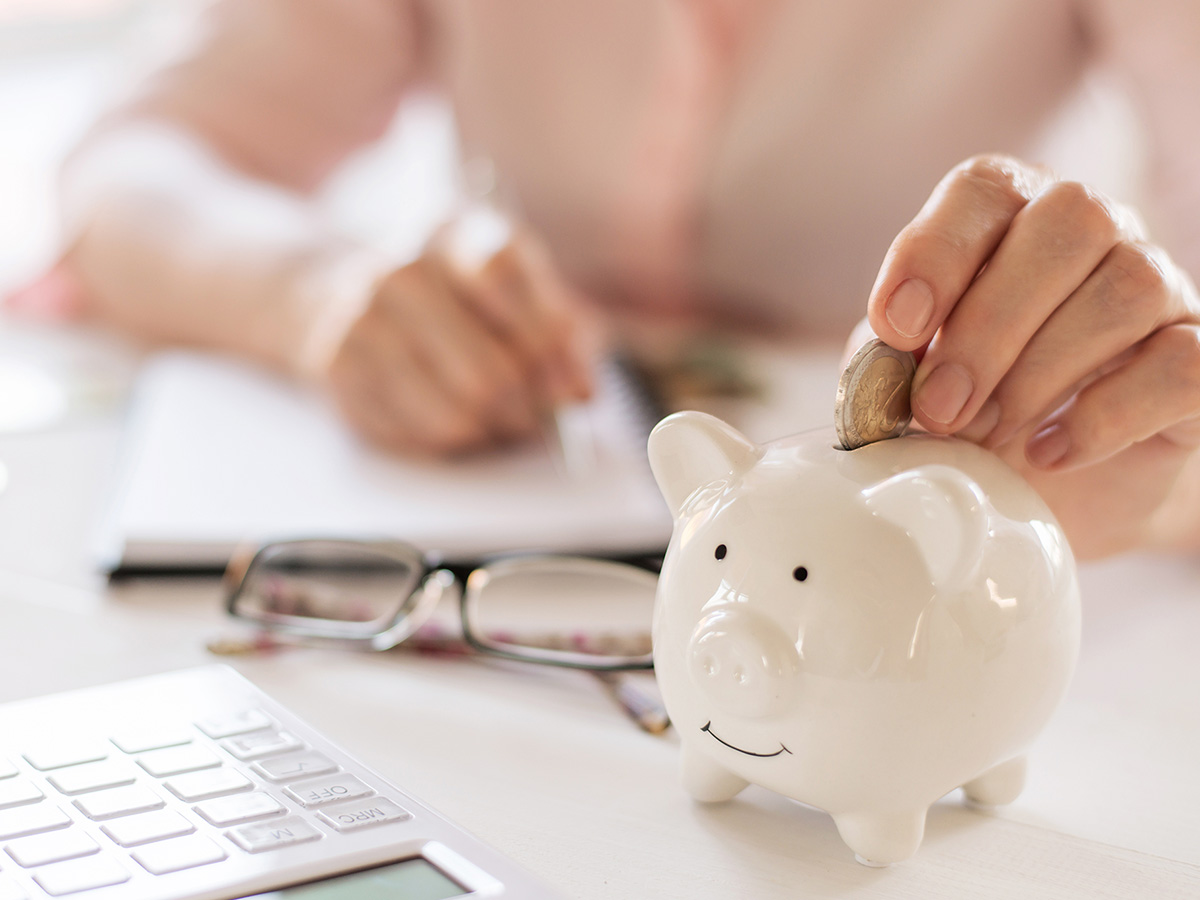 Image of a person saving money