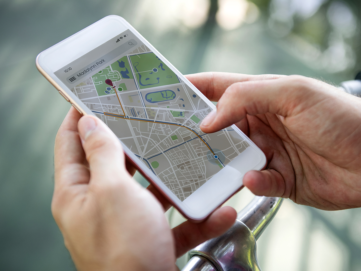 Image of a person using a map on a phone